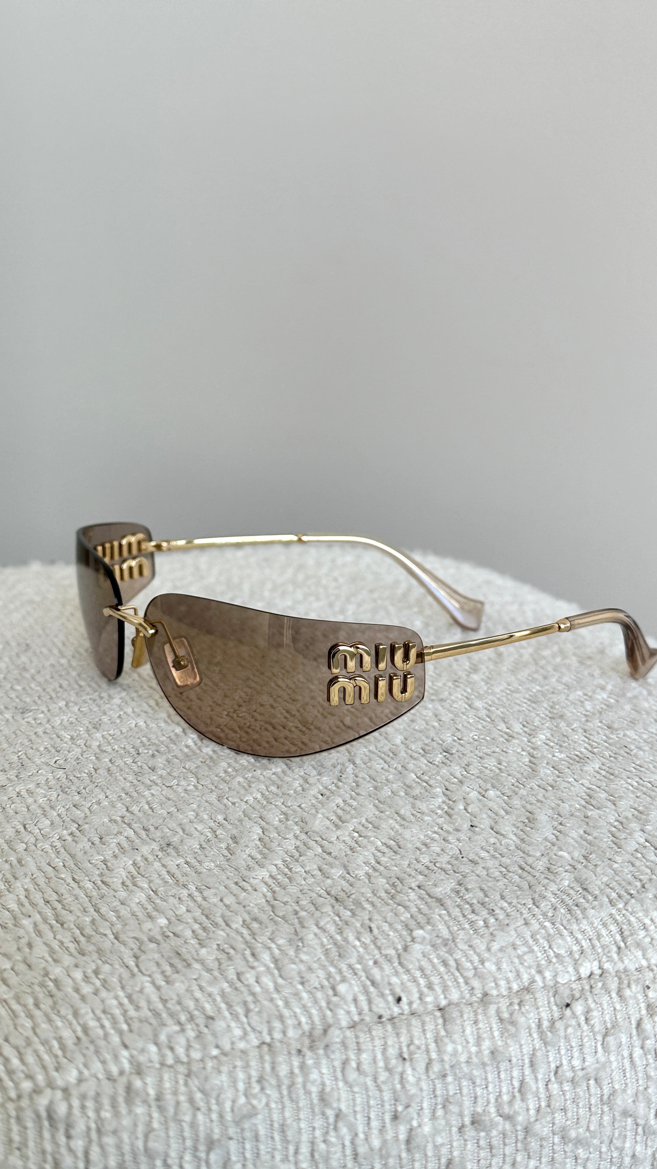 MIU MIU AUBE SUNGLASSES IN ROSE GOLD
