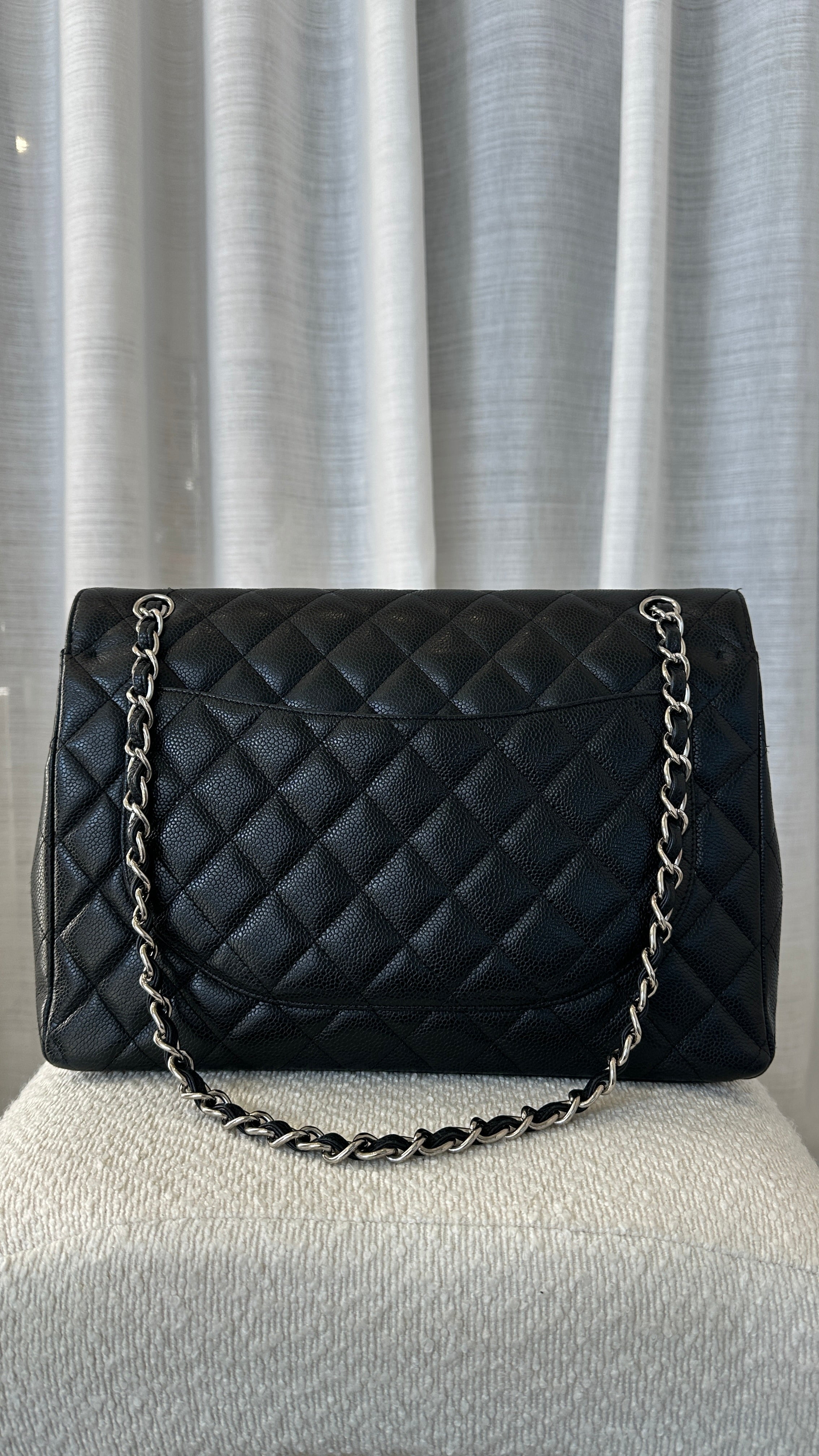 Chanel Maxi Caviar Leather Double Flap In Black