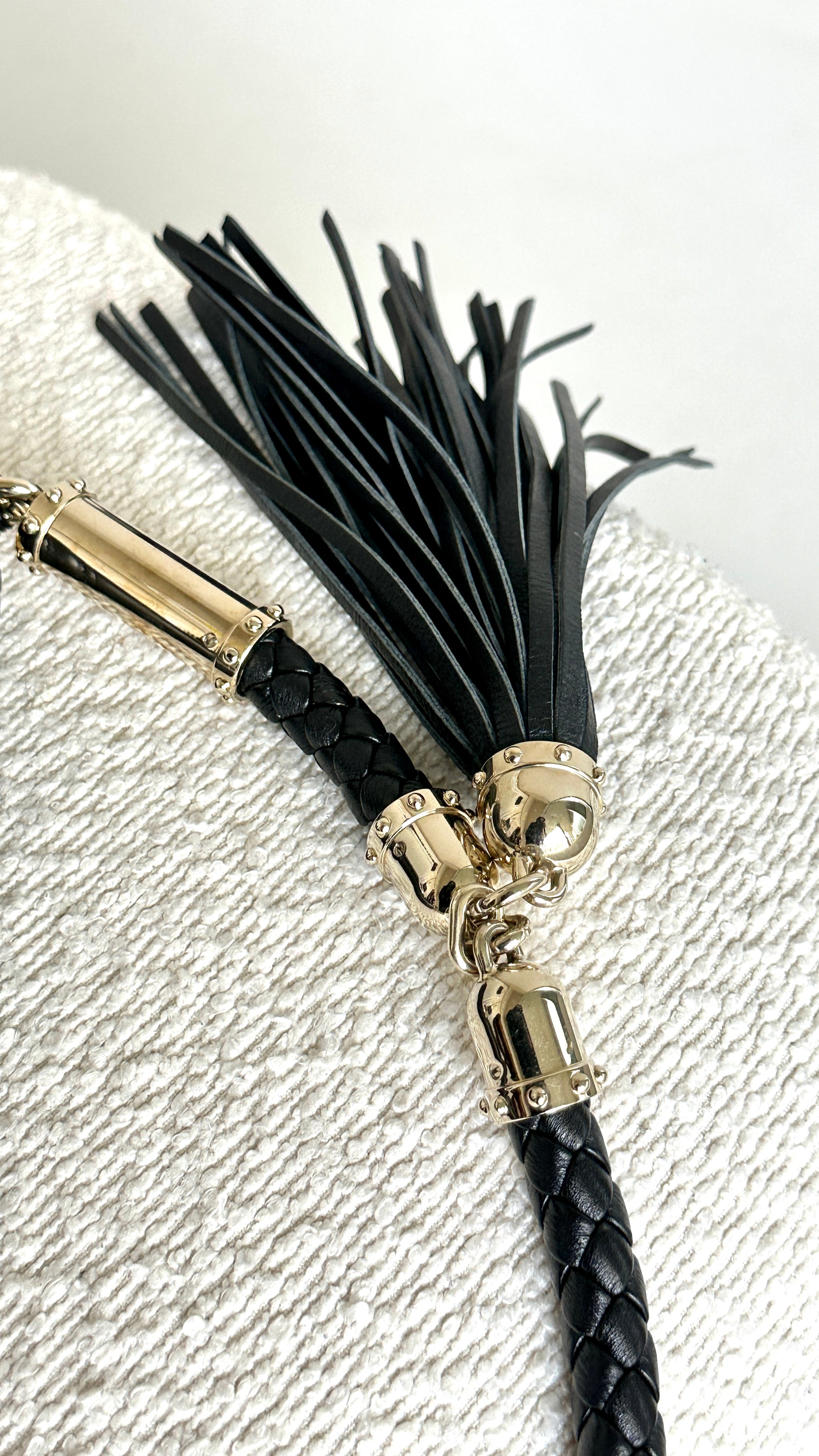 GUCCI BRITT TASSEL HANDBAG IN BLACK