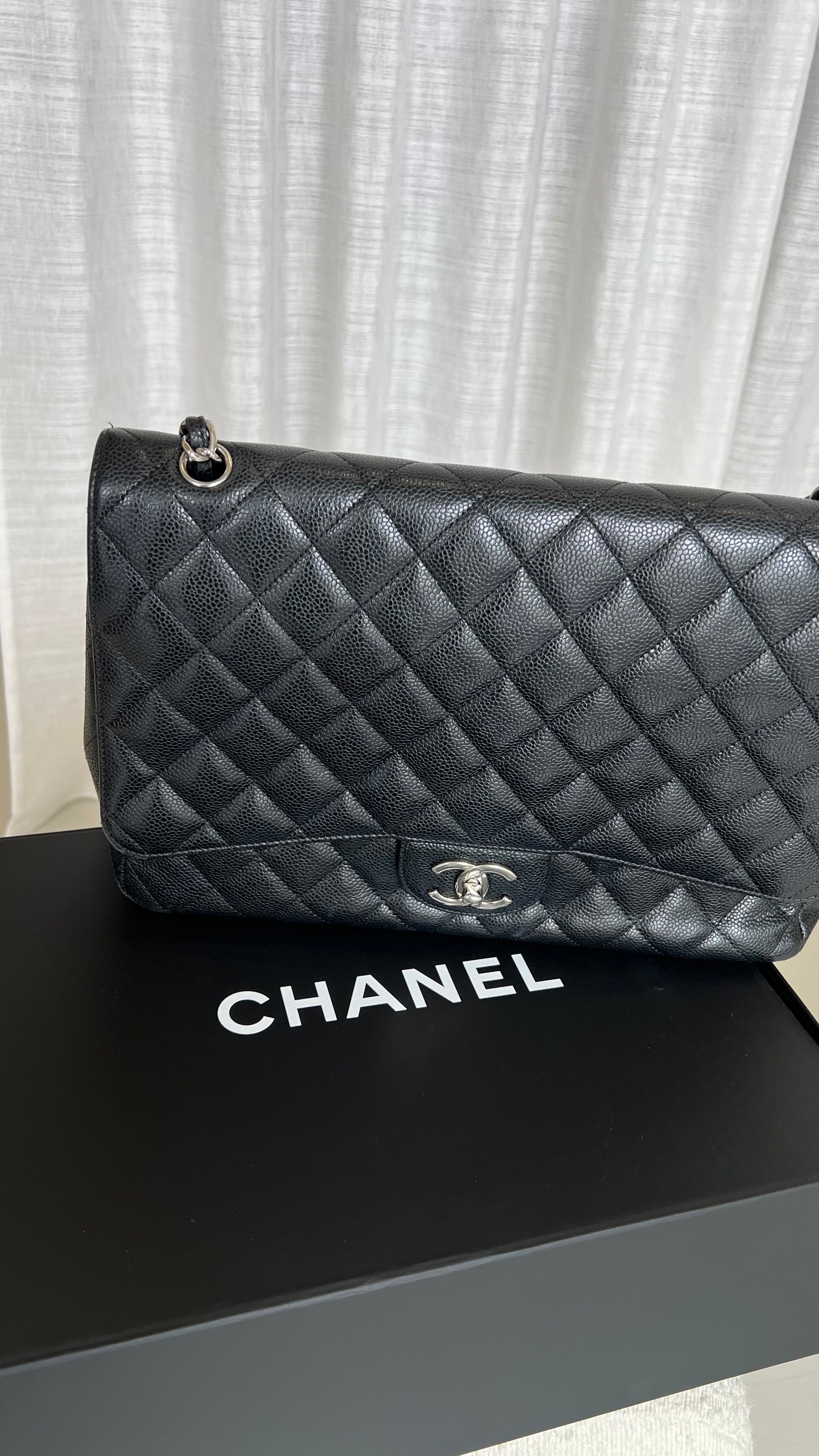 Chanel Maxi Caviar Leather Double Flap In Black
