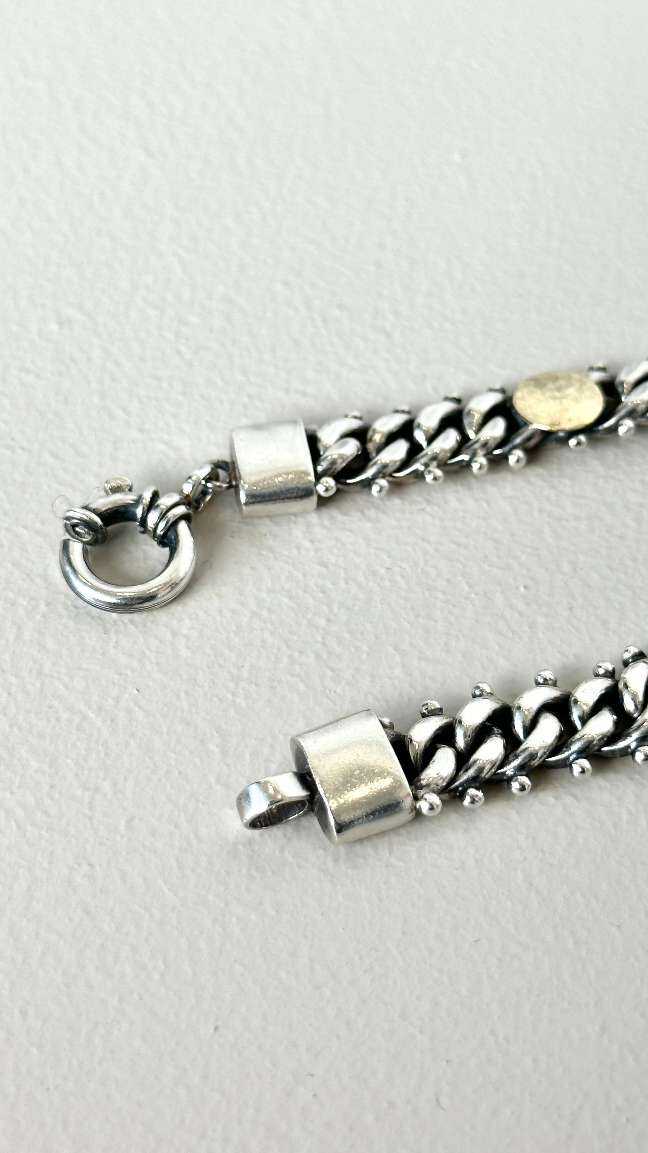 BRACELET IN SILVER WITH CIRCLES IN GOLD 9K
