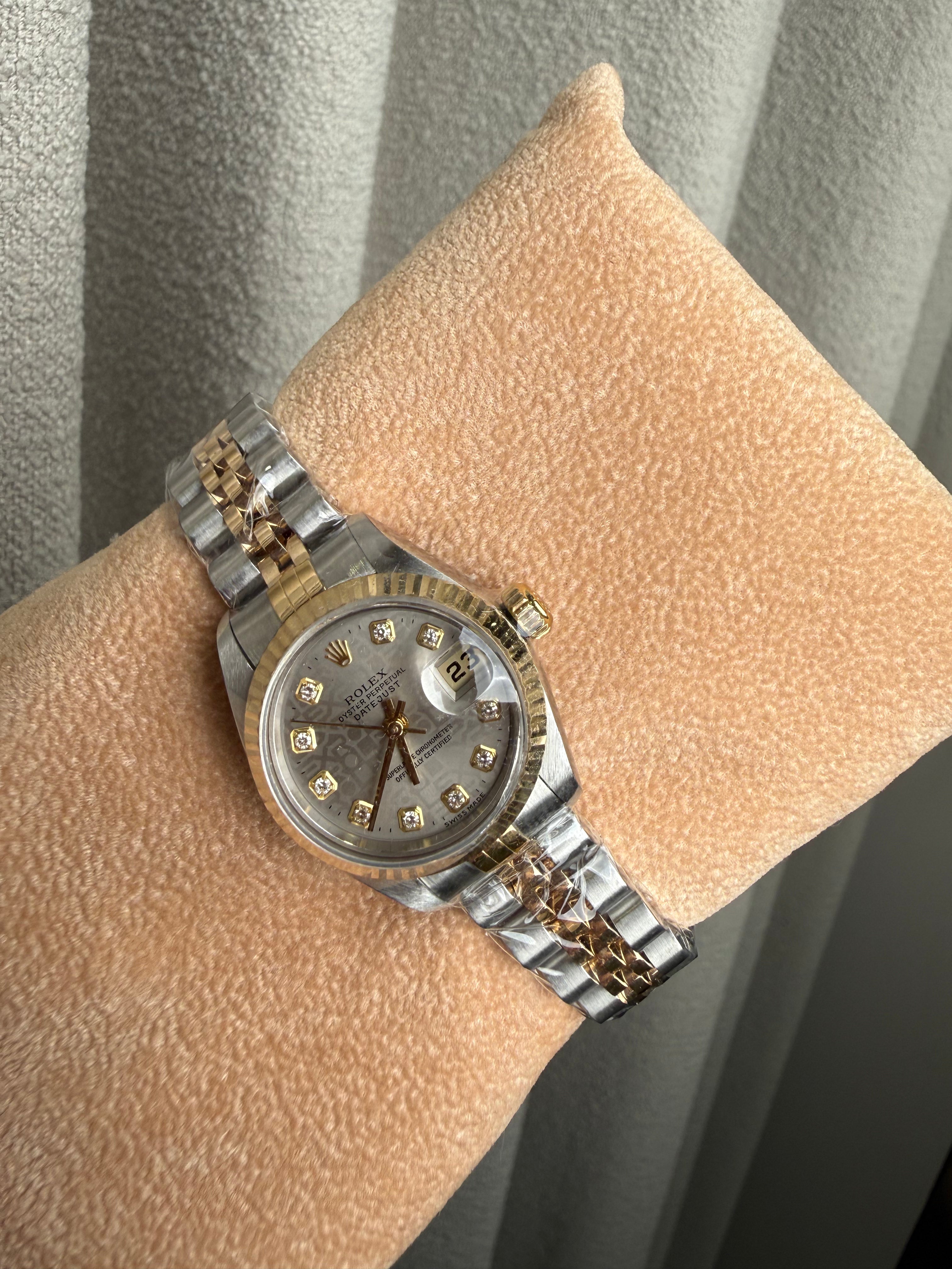 Datejust 26mm in Steel with Yellow Gold Fluted Bezel on Jubilee Bracelet with Silver Jubilee Diamond Dial