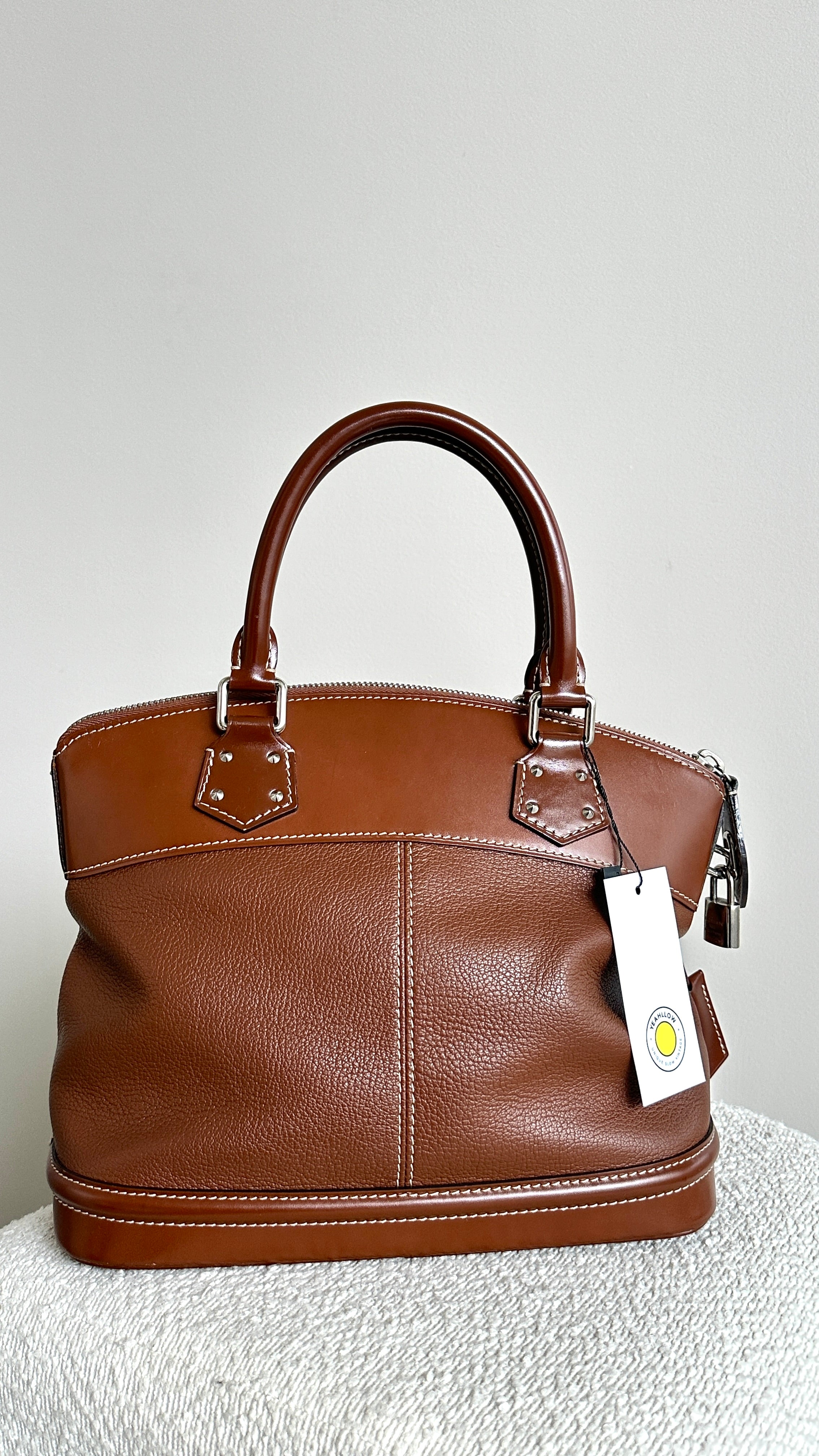 LOUIS VUITTON SIENNE SUHALI LEATHER PM BAG IN BROWN
