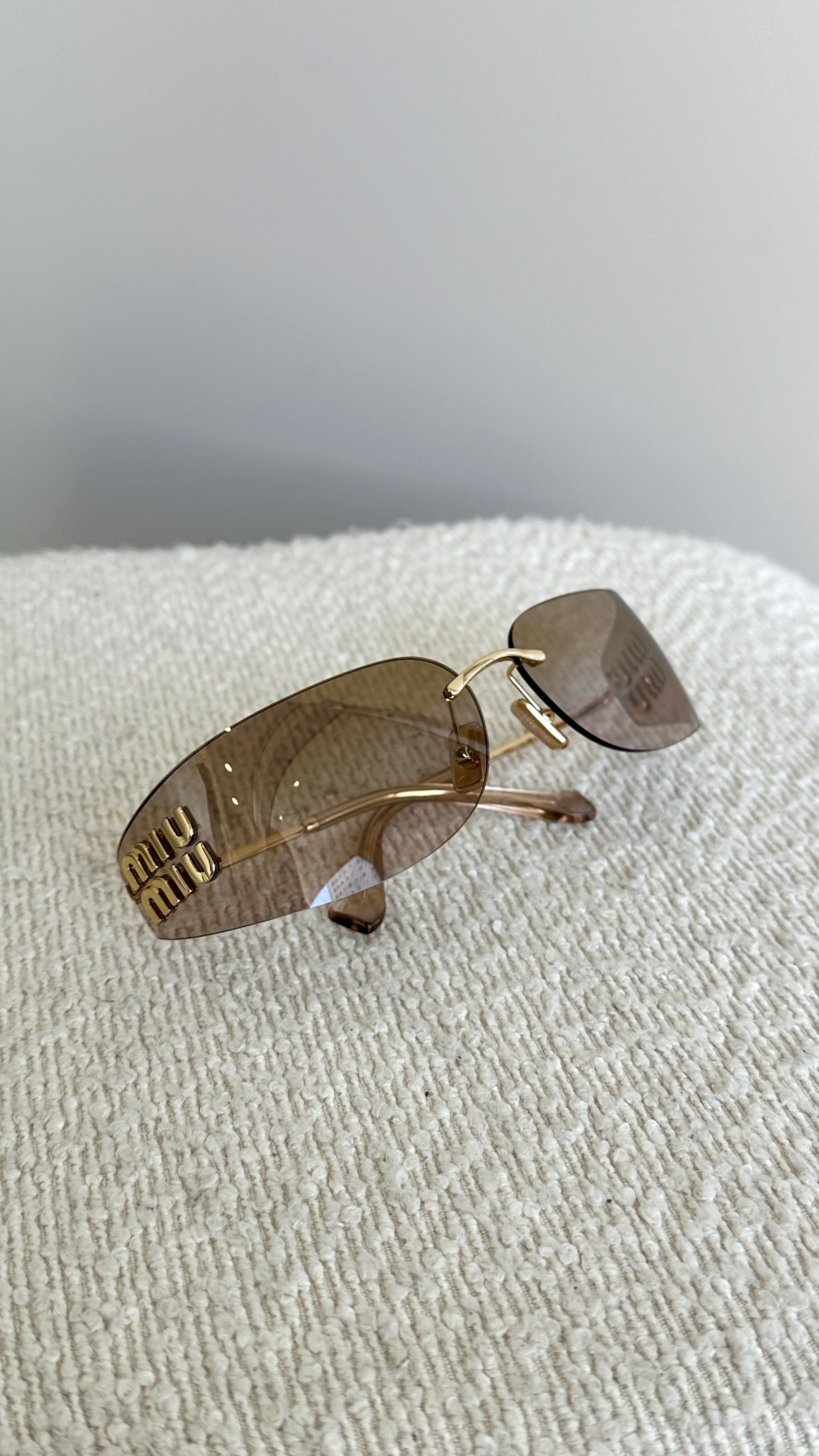 MIU MIU AUBE SUNGLASSES IN ROSE GOLD