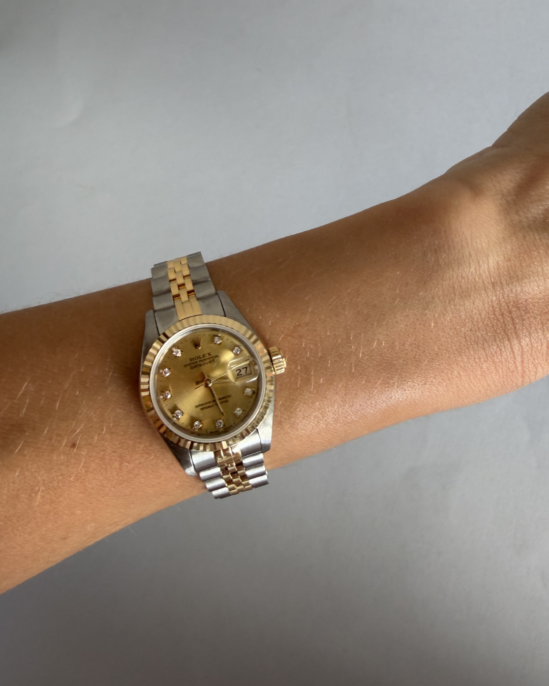 ROLEX LADY DATEJUST 26MM IN STEEL AND GOLD WITH CHAMPAGNE DIAL AND DIAMONDS