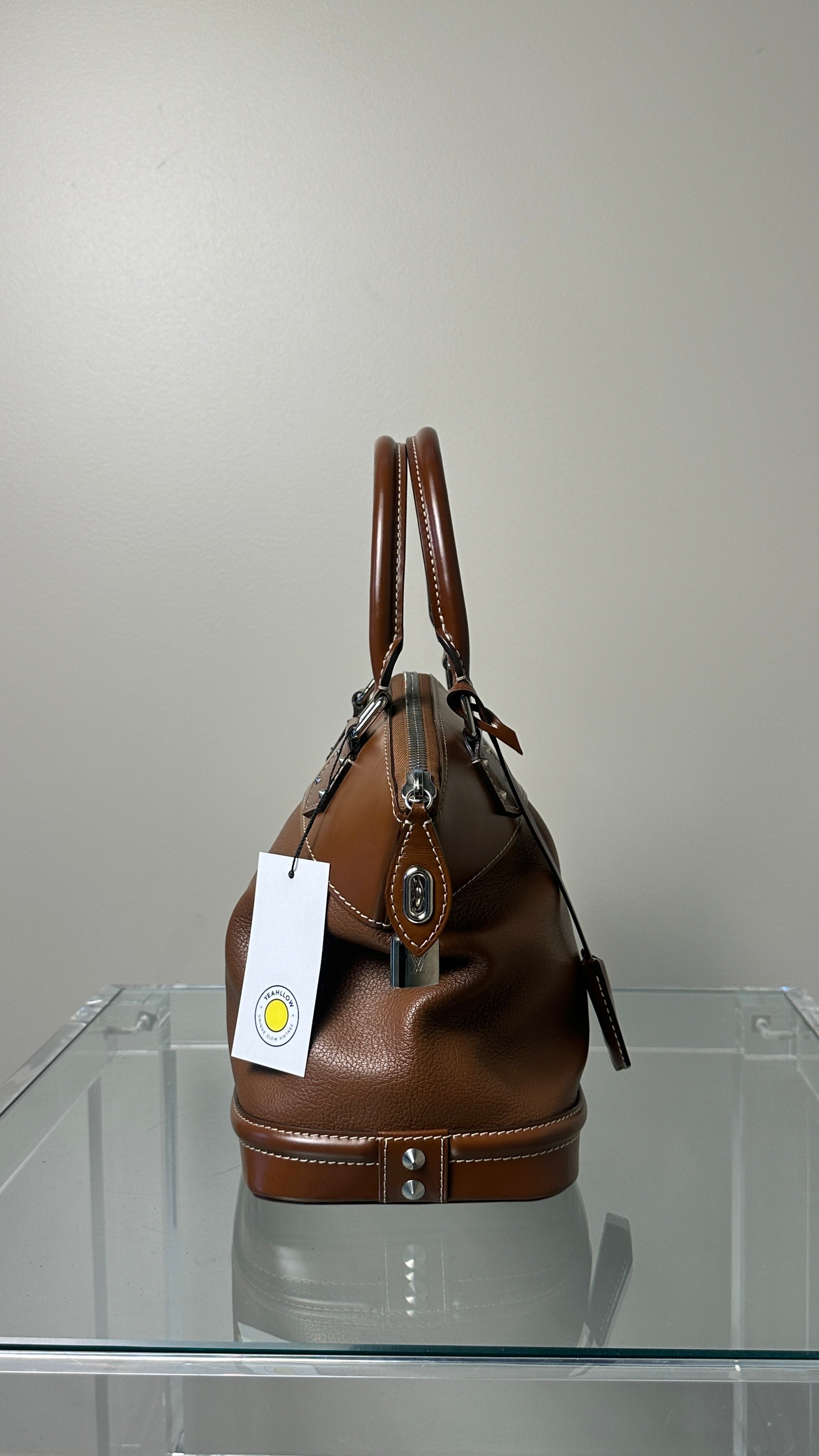 LOUIS VUITTON SIENNE SUHALI LEATHER PM BAG IN BROWN