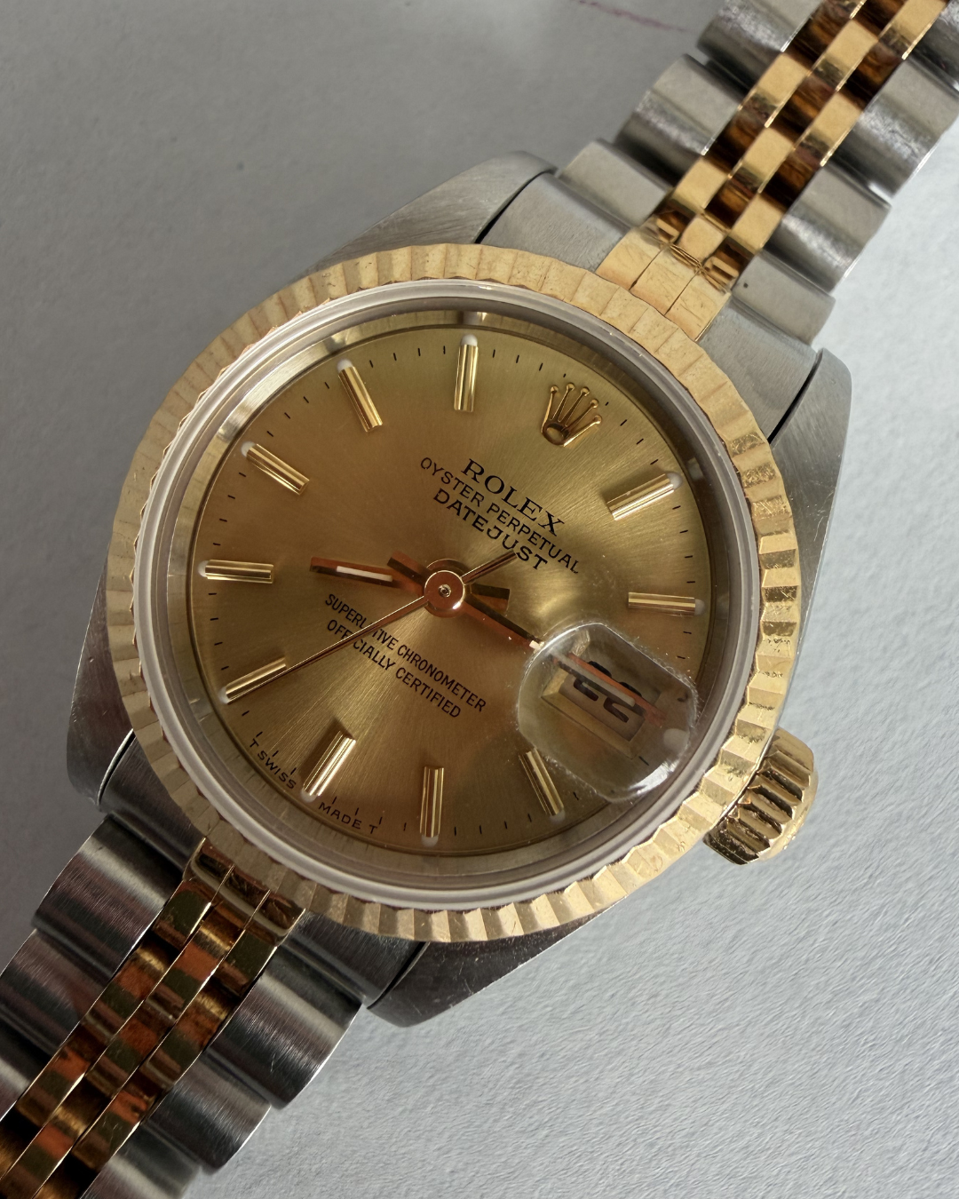 ROLEX LADY DATEJUST 26 MM COM MOSTRADOR CHAMPANHE