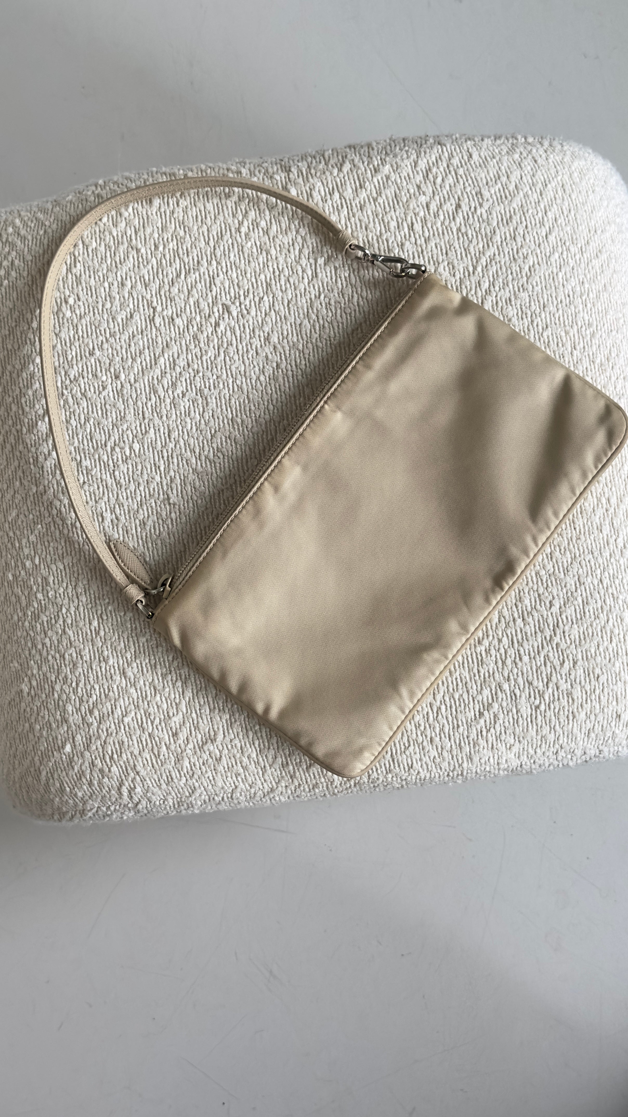 PRADA RE-NYLON TOP HANDLE BAG IN BEIGE