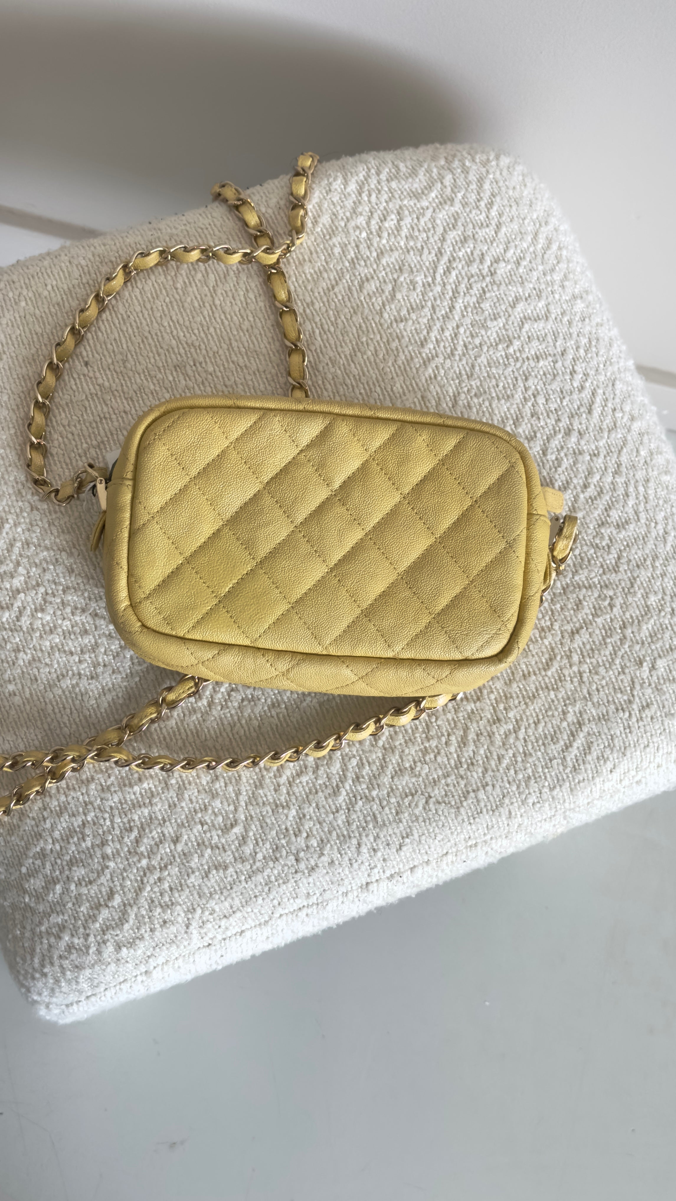 CHANEL MINI QUILTED IRIDESCENT CAVIAR CAMERA BAG IN YELLOW