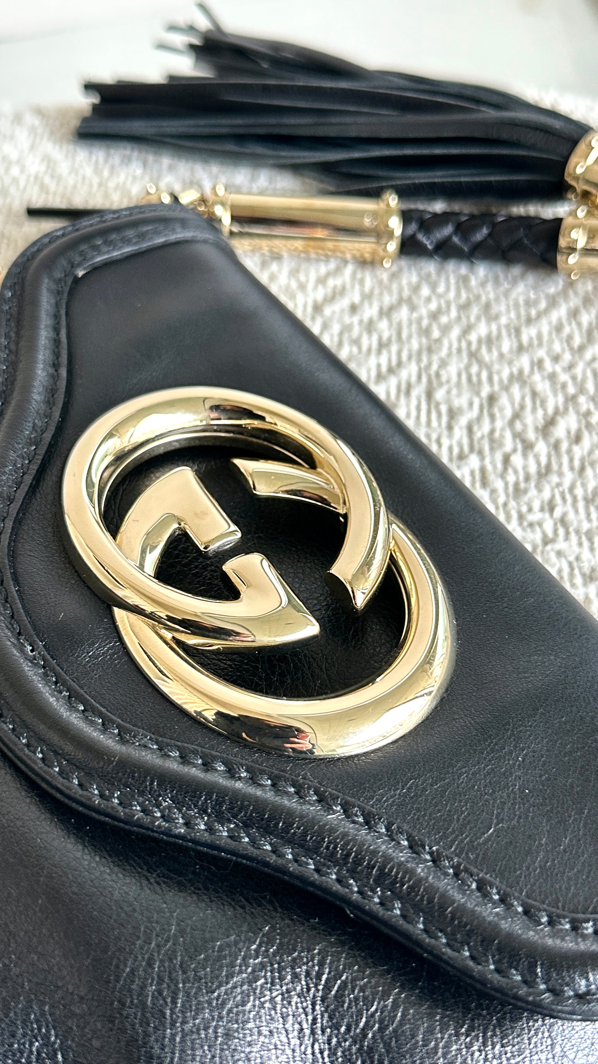 GUCCI BRITT TASSEL HANDBAG IN BLACK