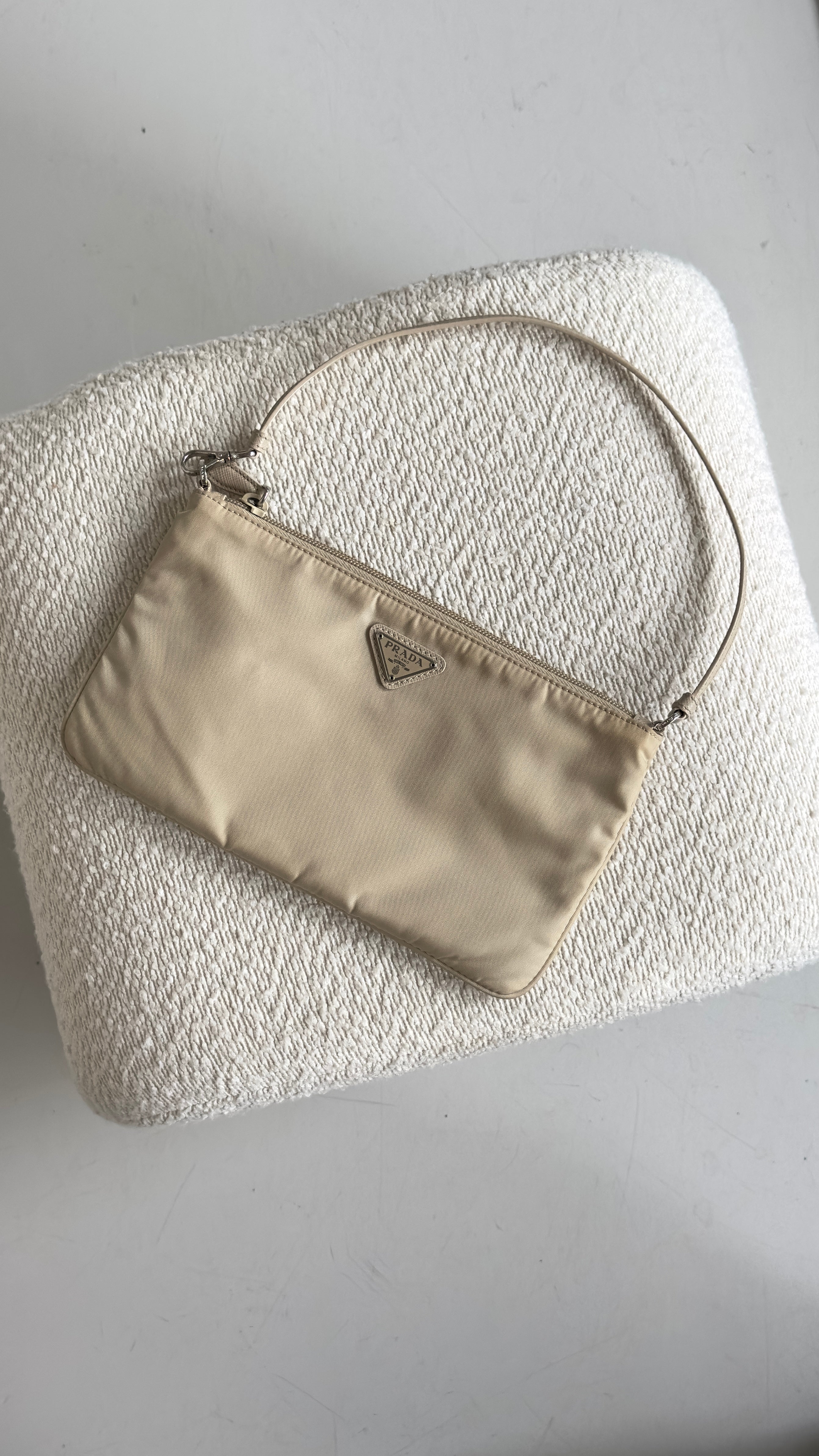 PRADA RE-NYLON TOP HANDLE BAG IN BEIGE
