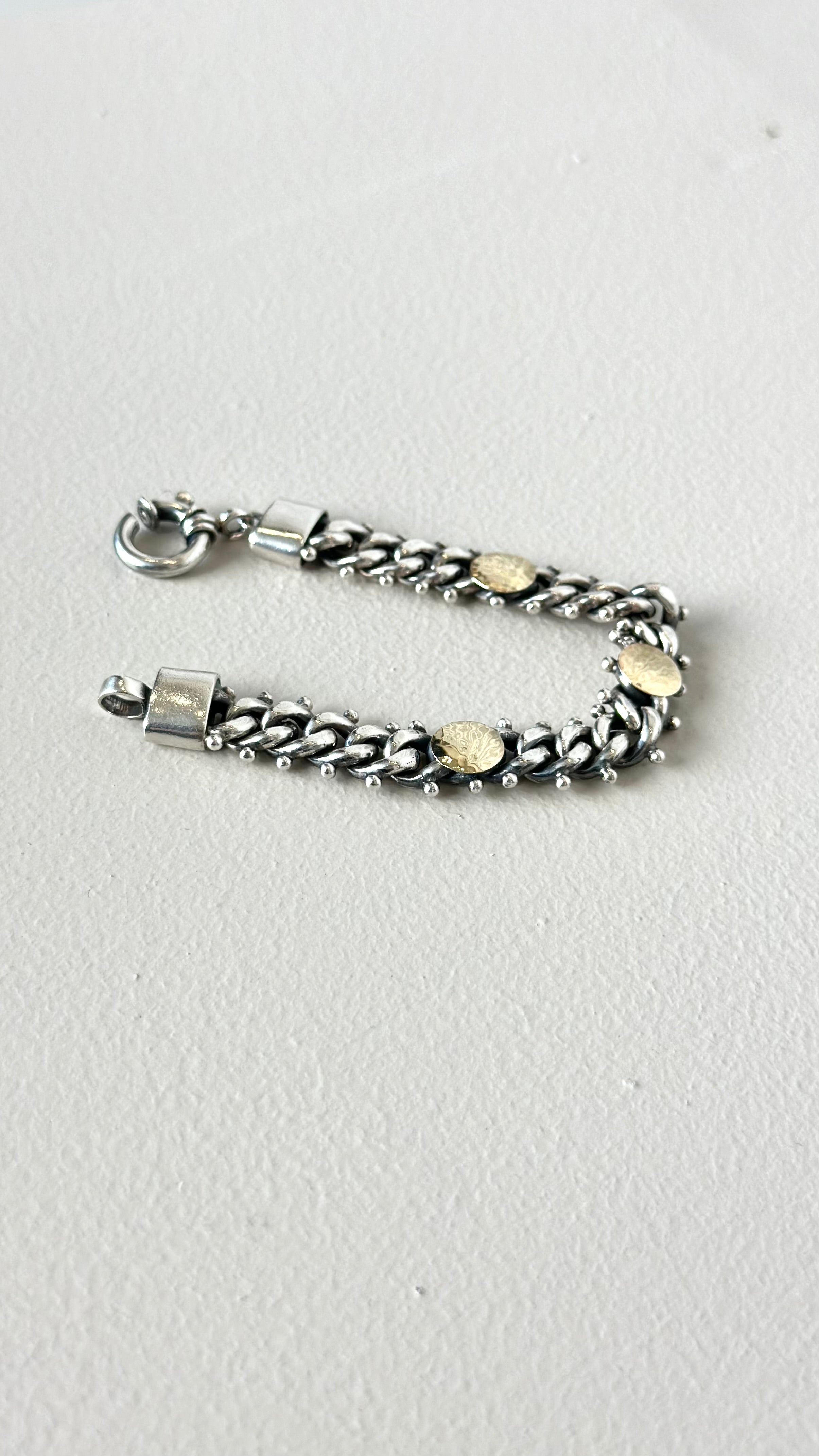 BRACELET IN SILVER WITH CIRCLES IN GOLD 9K