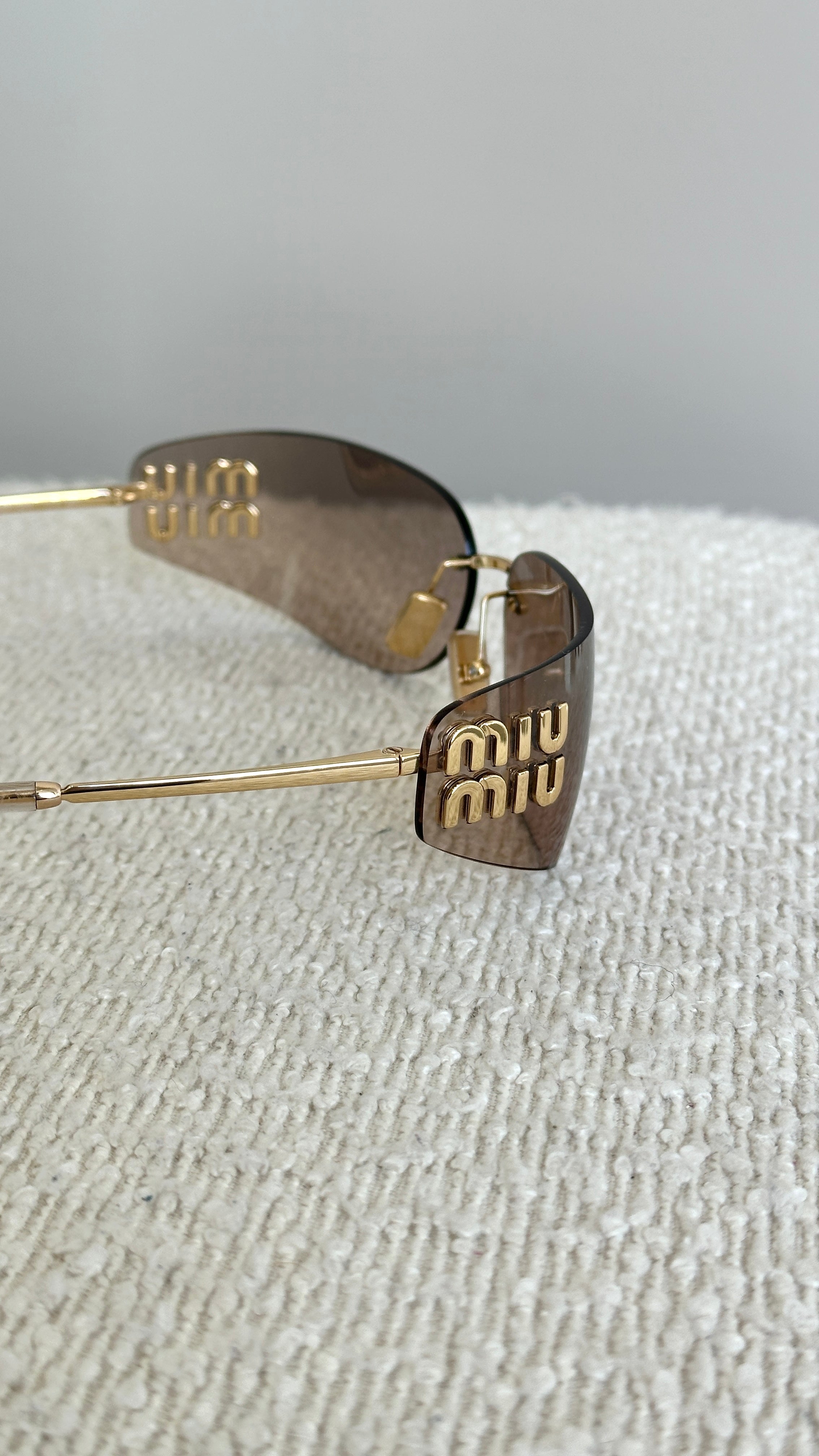 MIU MIU AUBE SUNGLASSES IN ROSE GOLD