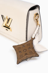 Louis Vuitton Twist MM Cream Bag