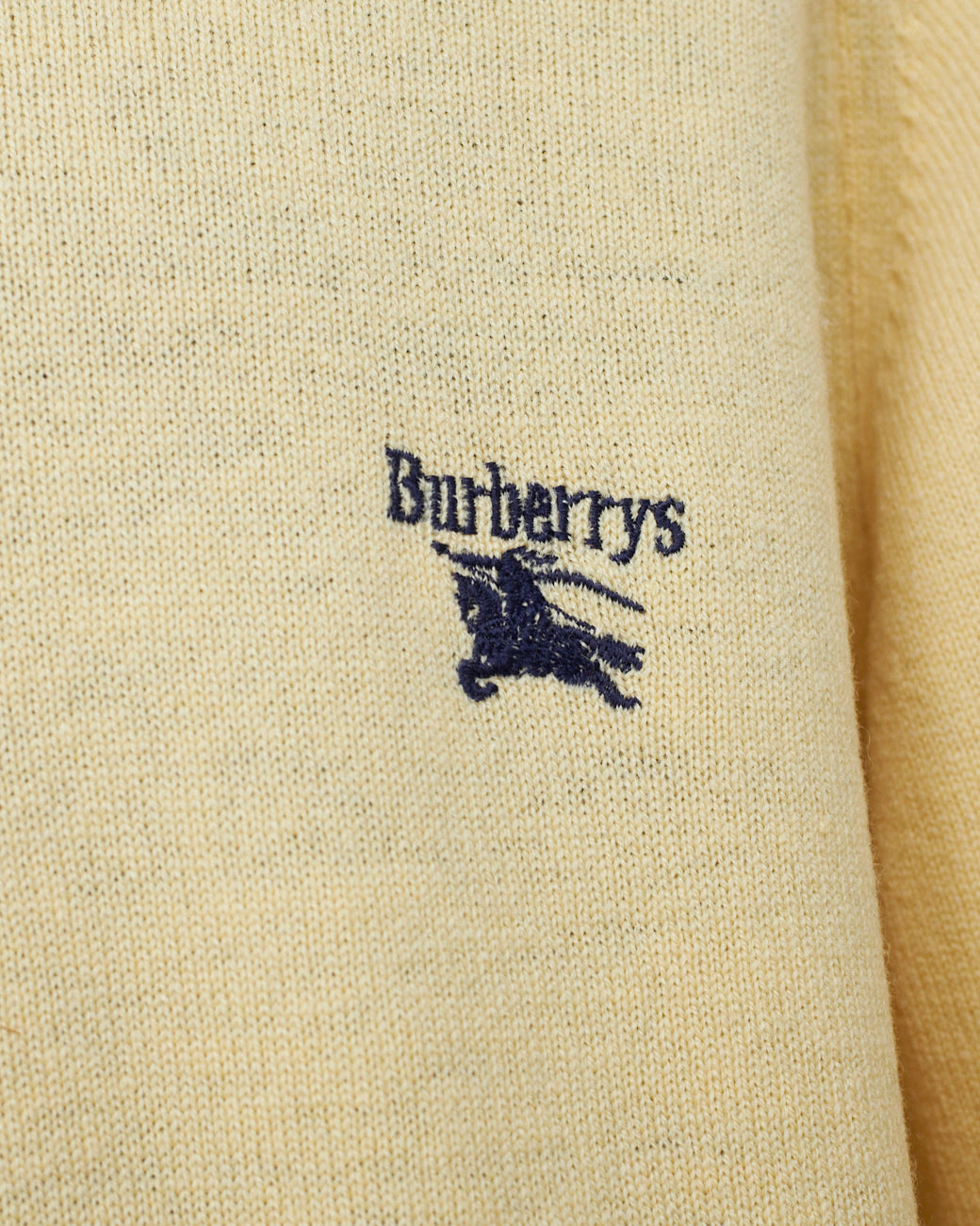 Burberry malha amarela com logotipo 