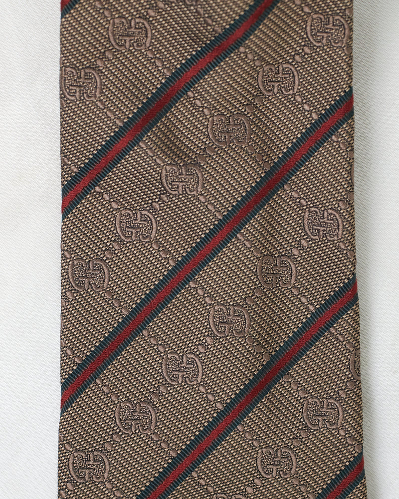 Cravate rayée à monogramme Gucci 
