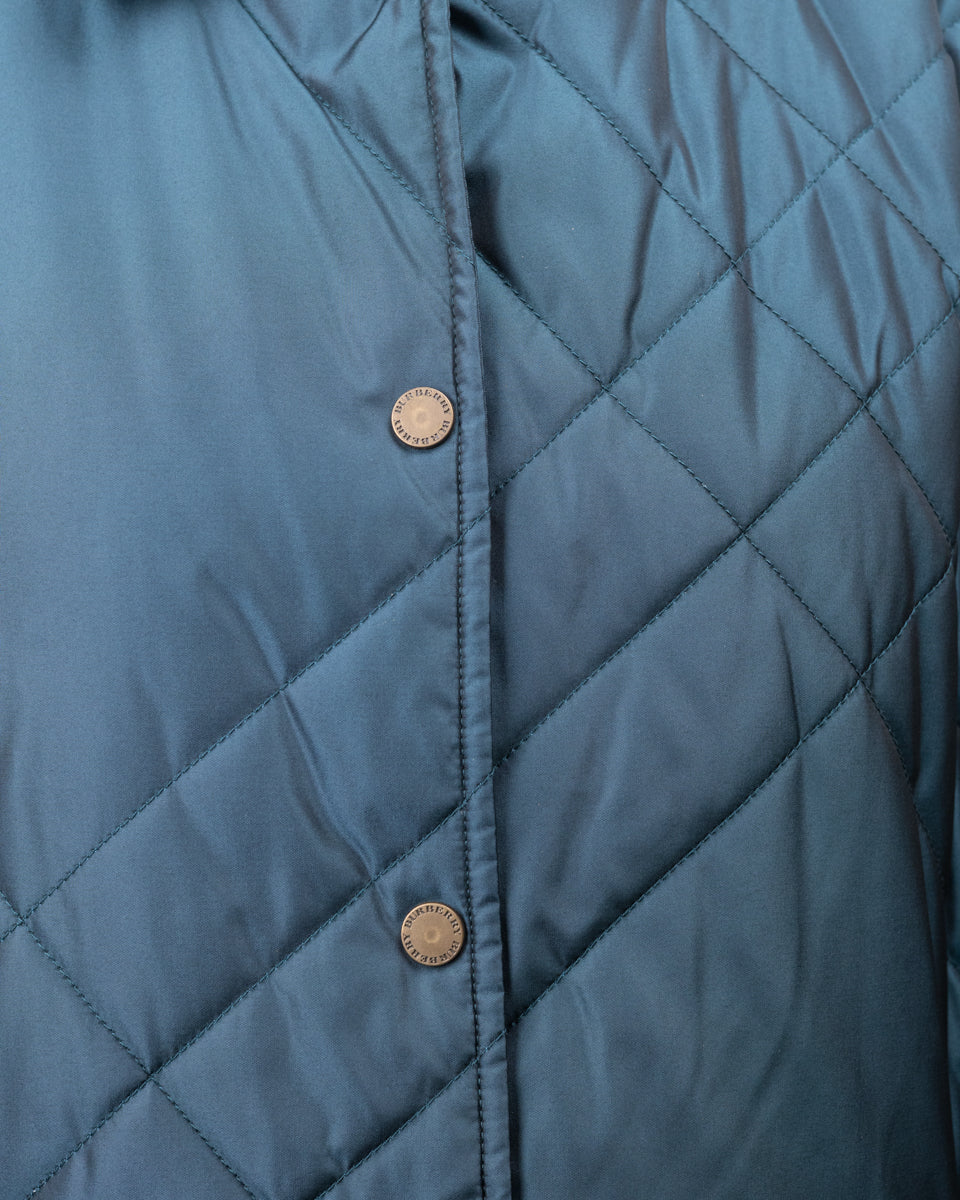 Manteau bleu Burberry avec col à carreaux